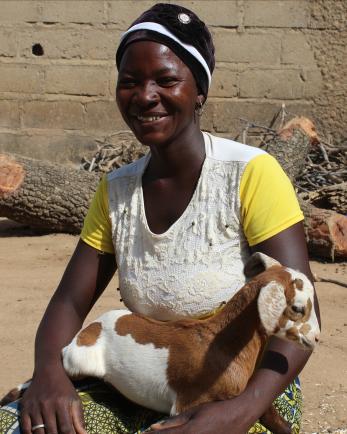 Woman with her goat.
